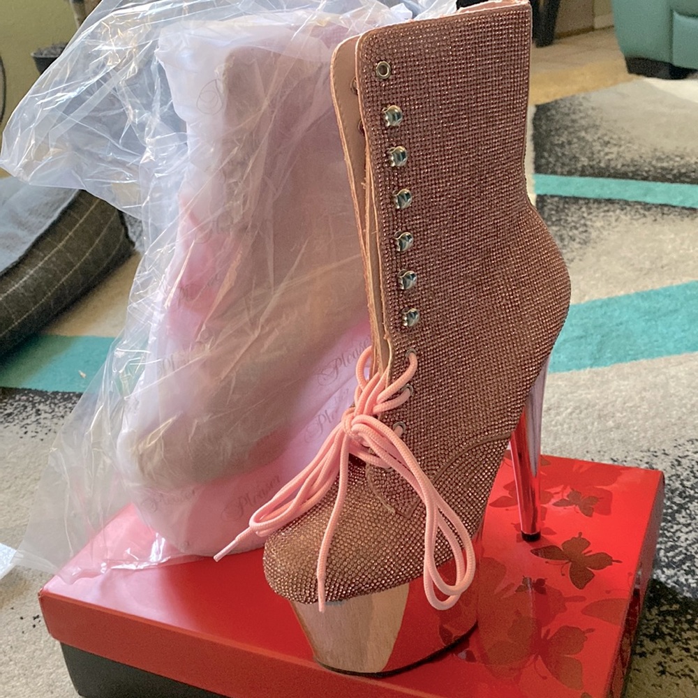 New in box. Pleaser’s platform boots. Baby pink.